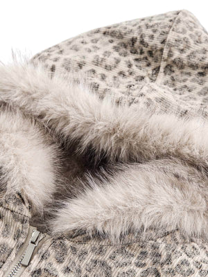 Wrap yourself in bold comfort with the Cheetah Print Mink Fur Hooded Jacket. Made from ultra-soft faux fur with cozy sherpa lining, this winter-ready jacket combines warmth with standout style. It features a detachable hood for versatile wear, ribbed cuff