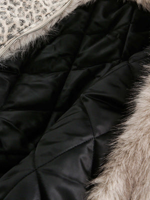 Wrap yourself in bold comfort with the Cheetah Print Mink Fur Hooded Jacket. Made from ultra-soft faux fur with cozy sherpa lining, this winter-ready jacket combines warmth with standout style. It features a detachable hood for versatile wear, ribbed cuff