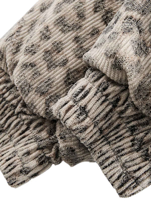 Wrap yourself in bold comfort with the Cheetah Print Mink Fur Hooded Jacket. Made from ultra-soft faux fur with cozy sherpa lining, this winter-ready jacket combines warmth with standout style. It features a detachable hood for versatile wear, ribbed cuff