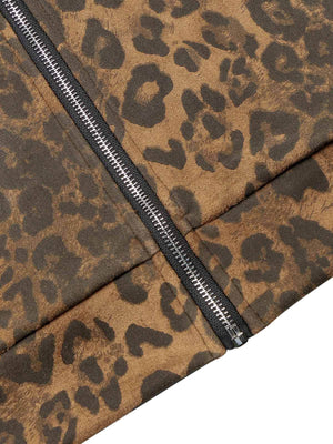 Make a fearless style statement with the Cheetah Print Suede Tracksuit. Crafted from soft and cozy faux fur, this bold matching set includes a zip-up jacket and matching pants, both featuring a standout leopard print design. Designed with ribbed cuffs and