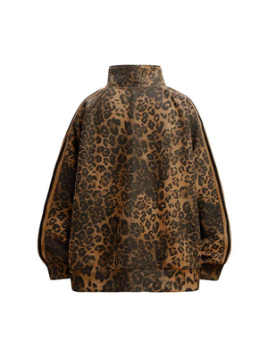 Make a fearless style statement with the Cheetah Print Suede Tracksuit. Crafted from soft and cozy faux fur, this bold matching set includes a zip-up jacket and matching pants, both featuring a standout leopard print design. Designed with ribbed cuffs and