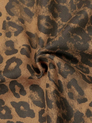 Make a fearless style statement with the Cheetah Print Suede Tracksuit. Crafted from soft and cozy faux fur, this bold matching set includes a zip-up jacket and matching pants, both featuring a standout leopard print design. Designed with ribbed cuffs and