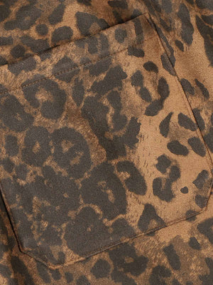 Make a fearless style statement with the Cheetah Print Suede Tracksuit. Crafted from soft and cozy faux fur, this bold matching set includes a zip-up jacket and matching pants, both featuring a standout leopard print design. Designed with ribbed cuffs and