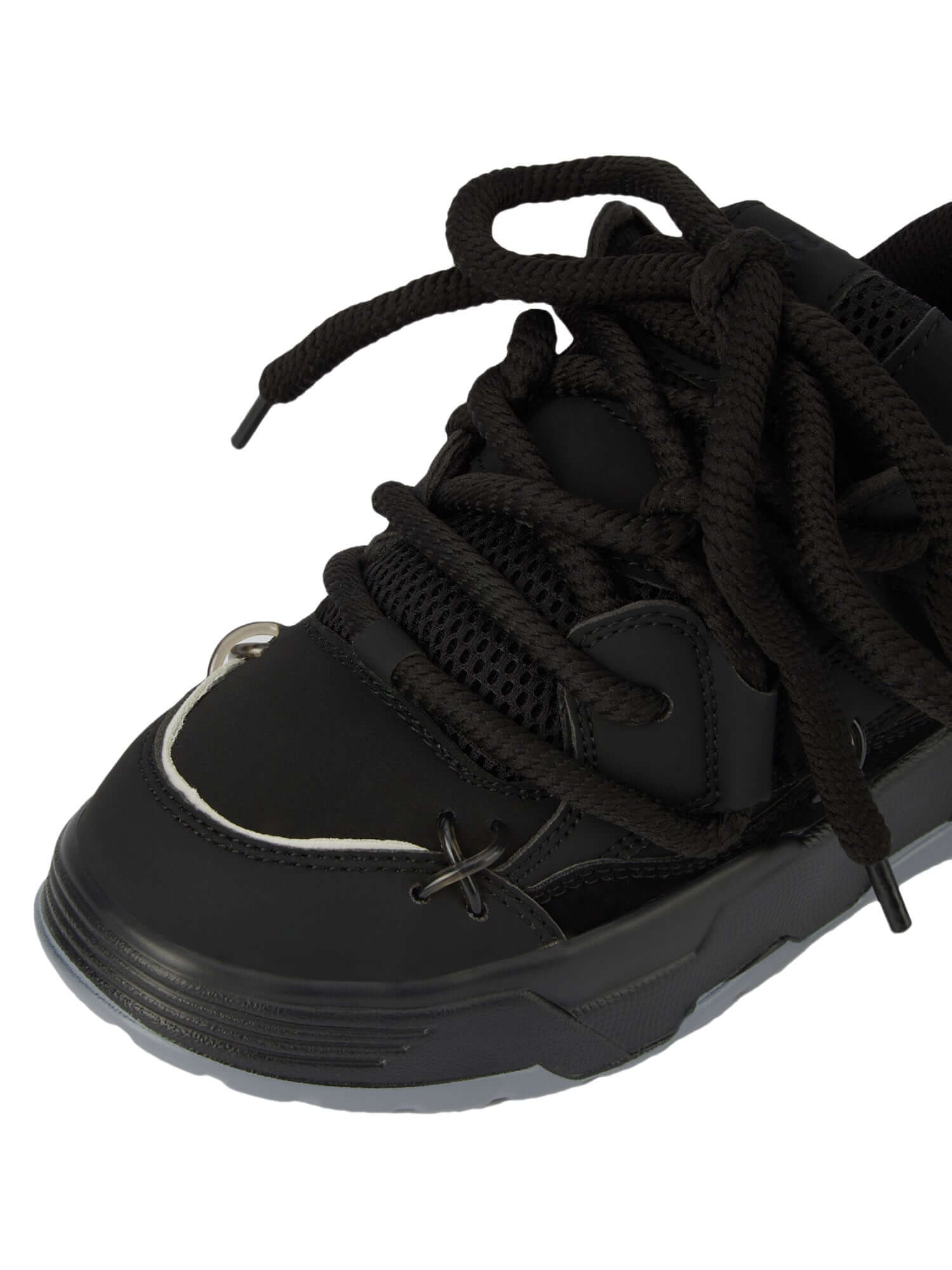 Step into bold comfort with the Chunky Rope Shoes — a modern essential for urban fashion lovers. Crafted from durable synthetic leather with breathable mesh panels, these sneakers feature reflective details for enhanced visibility, a chunky cushioned sole