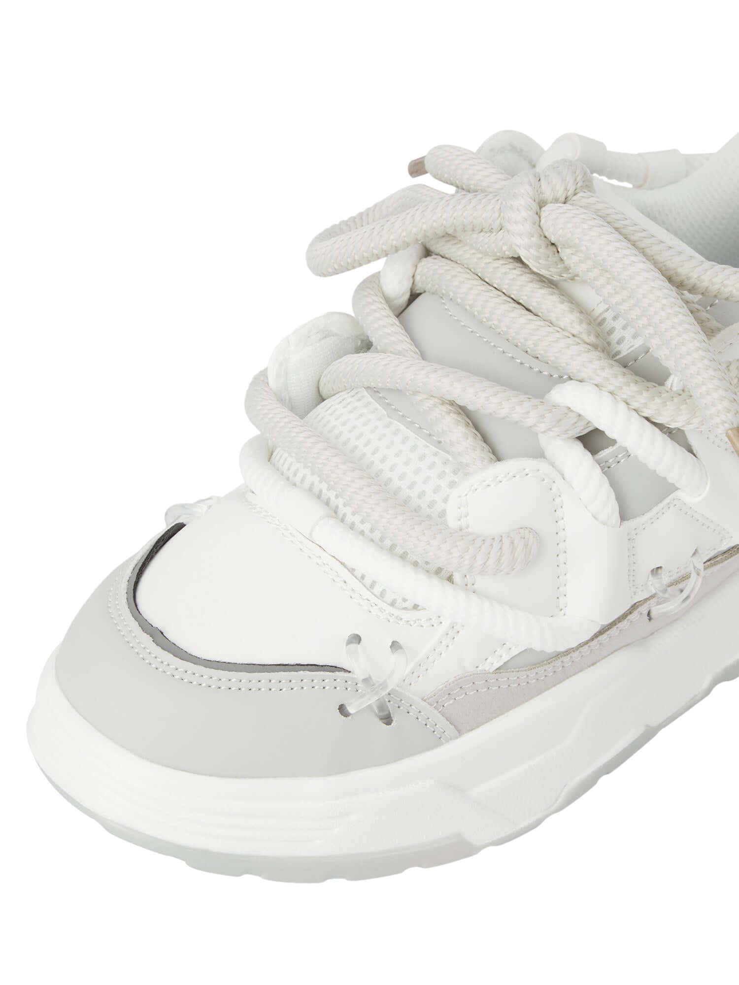 Step into bold comfort with the Chunky Rope Shoes — a modern essential for urban fashion lovers. Crafted from durable synthetic leather with breathable mesh panels, these sneakers feature reflective details for enhanced visibility, a chunky cushioned sole