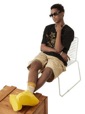 Chunky low top sneakers – on model seated, yellow | XoKool