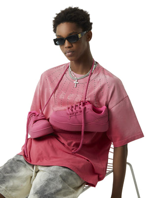 Chunky low top sneakers – on model holding pink | XoKool