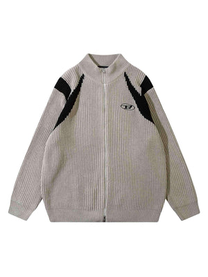 Upgrade your casual wardrobe with the Color Block Zipper Sweater Jacket. Crafted from a breathable cotton blend, this stylish jacket features bold contrast panels and a vintage-inspired color block design. Designed with a full zipper closure, ribbed cuffs
