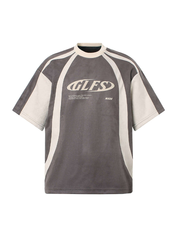 Add edge to your everyday look with the Jersey Deconstructed Contrast Color Stitching T Shirt. Made from a soft, breathable cotton blend, this short-sleeve tee features a modern color-block design and bold graphic branding that captures true streetwear at