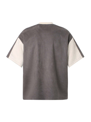 Add edge to your everyday look with the Jersey Deconstructed Contrast Color Stitching T Shirt. Made from a soft, breathable cotton blend, this short-sleeve tee features a modern color-block design and bold graphic branding that captures true streetwear at