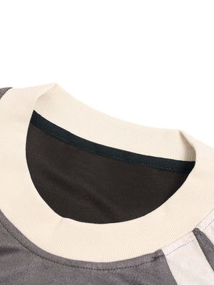 Add edge to your everyday look with the Jersey Deconstructed Contrast Color Stitching T Shirt. Made from a soft, breathable cotton blend, this short-sleeve tee features a modern color-block design and bold graphic branding that captures true streetwear at