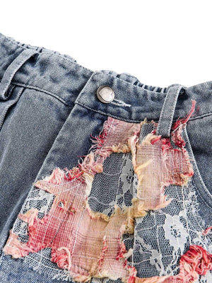 Add a touch of boho charm to your summer look with the Craftsmanship Ripped Floral Denim Shorts. Made from durable denim, these high-waisted shorts feature beautiful floral embroidery and a frayed hem for the perfect blend of femininity and edge. Designed