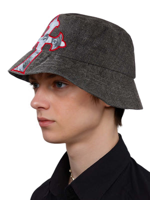 Make a bold fashion statement with the Cross And Portrait Denim Bucket Hat — a standout piece that blends edgy design with modern streetwear aesthetics. Crafted from a premium cotton blend, this structured hat features an embroidered cross design with a s