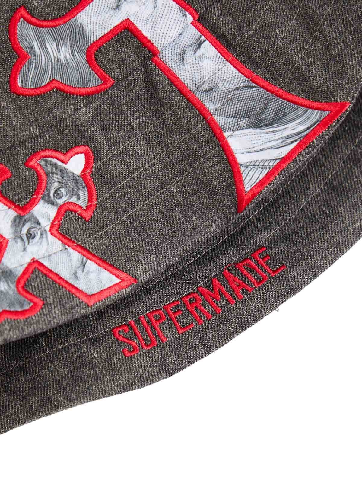 Make a bold fashion statement with the Cross And Portrait Denim Bucket Hat — a standout piece that blends edgy design with modern streetwear aesthetics. Crafted from a premium cotton blend, this structured hat features an embroidered cross design with a s