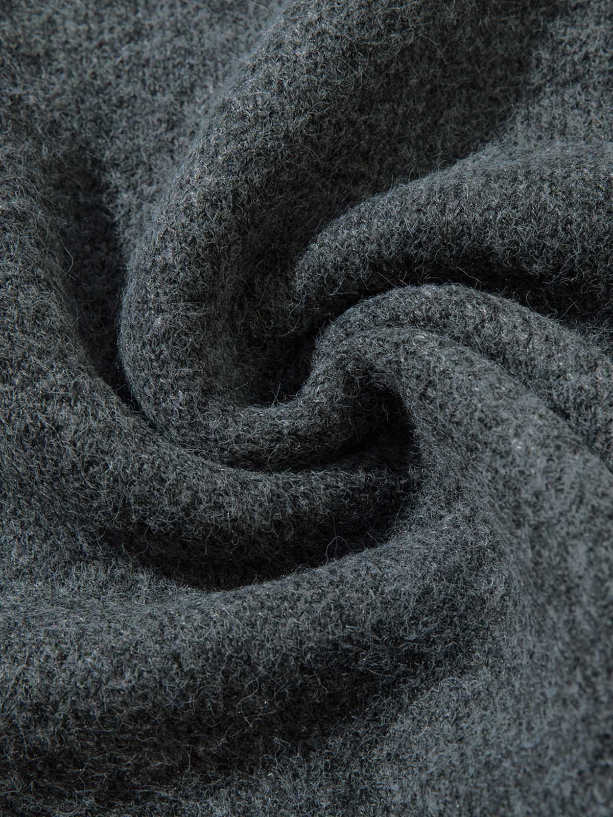Add effortless edge to your wardrobe with the Distressed Quarter Zip Sweater. Made from a soft and breathable cotton blend, this versatile sweater features a half-zip closure, ribbed cuffs and hem, and distressed edges for a bold, urban look. Perfect for