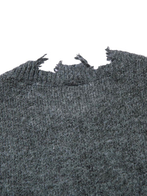 Add effortless edge to your wardrobe with the Distressed Quarter Zip Sweater. Made from a soft and breathable cotton blend, this versatile sweater features a half-zip closure, ribbed cuffs and hem, and distressed edges for a bold, urban look. Perfect for