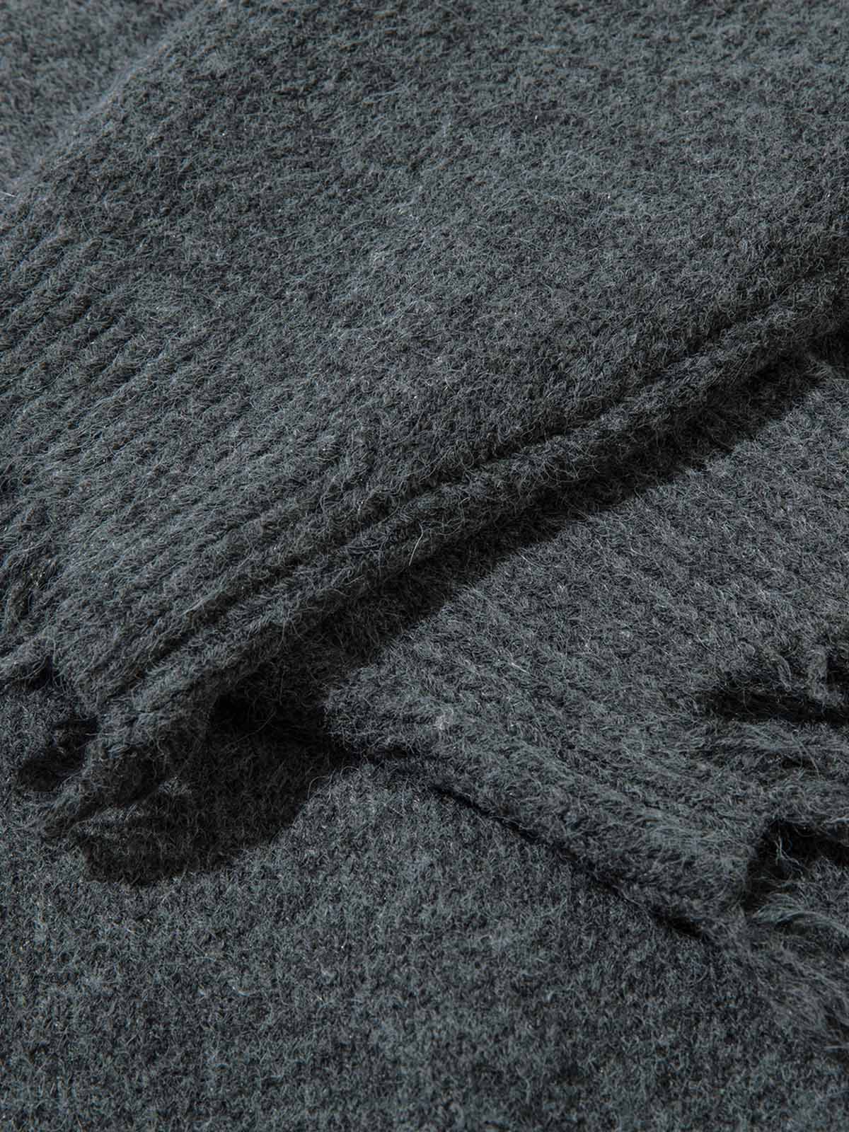 Add effortless edge to your wardrobe with the Distressed Quarter Zip Sweater. Made from a soft and breathable cotton blend, this versatile sweater features a half-zip closure, ribbed cuffs and hem, and distressed edges for a bold, urban look. Perfect for