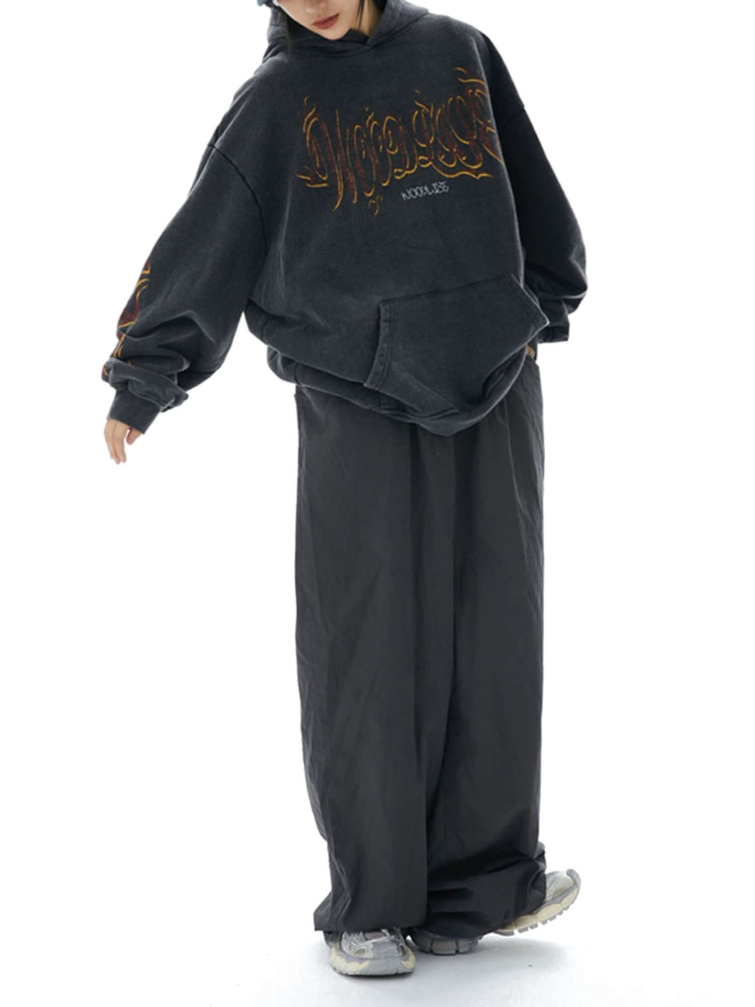 Bring the heat to your wardrobe with the Flame Letter Washed Hooded Sweatshirt. Designed in an oversized fit from a soft cotton blend, this hoodie features distressed flame graphics and gothic typography that create a raw, rebellious edge. Ribbed cuffs an