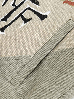 Make a bold statement with the Graffiti Patchwork Lapel Denim Jacket — where edgy graphics meet everyday comfort. Crafted from durable cotton twill, this standout piece features embroidered skulls, crossbones, and graffiti-style text across a patchwork de