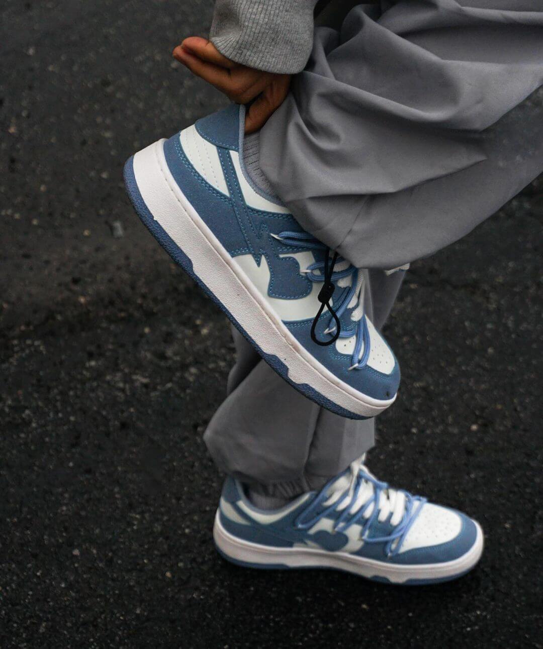 Step into effortless streetwear with the Haze Blue Love Breathable Board Shoes — the perfect balance of comfort, durability, and fresh style. Crafted from lightweight canvas with a sturdy rubber sole, these sneakers feature a classic lace-up closure, perf