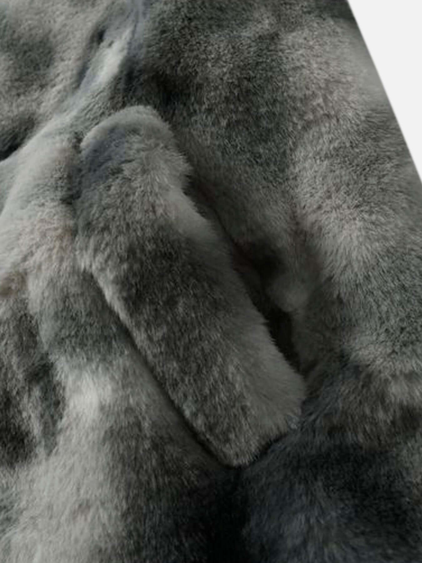 Wrap yourself in warmth and street style with the Heavy Duty Faux Lambswool Tie Dye Urban Jacket. Made from ultra-soft faux fur, this winter essential combines comfort and bold design in one standout piece. The loose fit and high-neck construction offer a