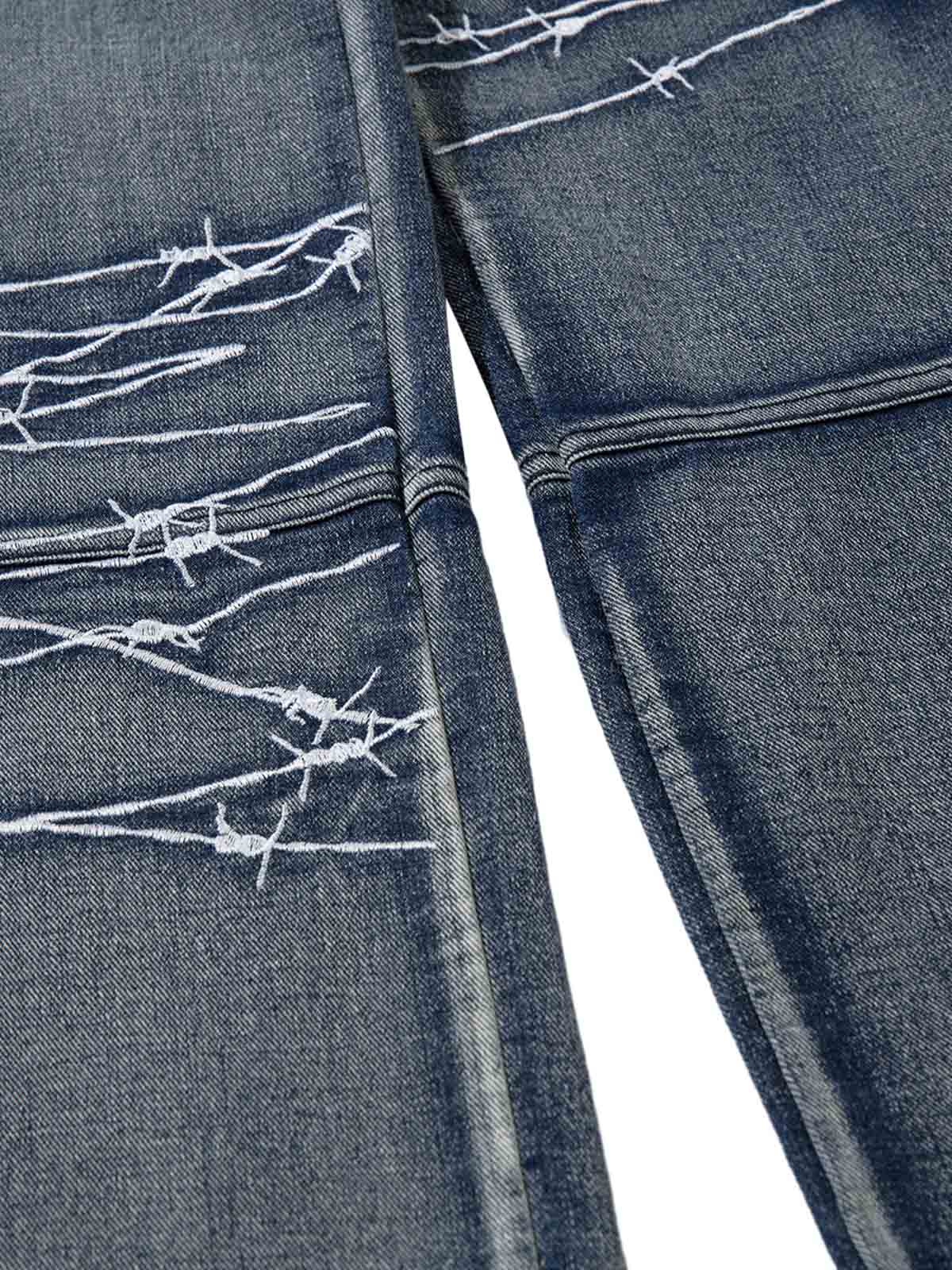 Upgrade your streetwear rotation with the High Street Embroidery Hip Hop Jeans. Crafted from a durable cotton blend, these jeans feature a utility-inspired design with multiple functional pockets, edgy zipper accents, and an adjustable waistband for a cus