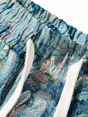 Bring bold vibes to your summer wardrobe with the High Street Jacquard Embroidery Shorts — the perfect blend of comfort and beach-ready flair. Made from a lightweight cotton blend, these shorts feature a vibrant tropical jacquard print, elastic waistband