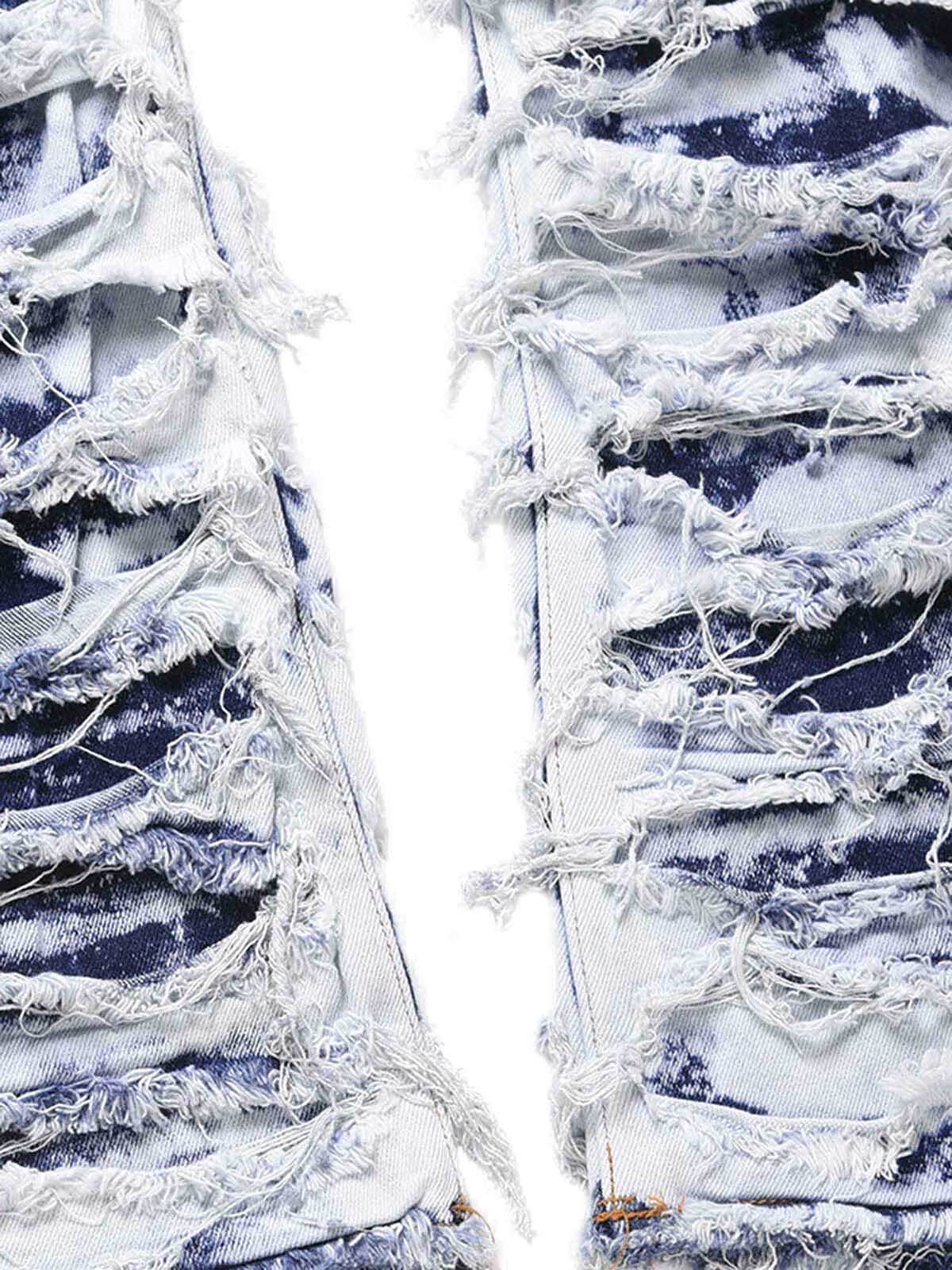 Jeans deshilachados con efecto bleach – detalle del deshilachado en la pierna | XoKool