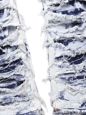 Jeans deshilachados con efecto bleach – detalle del deshilachado en la pierna | XoKool