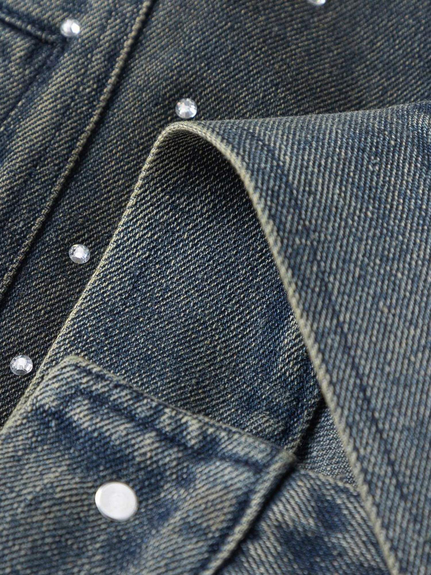 Bring vintage attitude to your wardrobe with the Hip-hop Beaded Washed Denim Jacket — a standout fusion of rugged style and everyday comfort. Crafted from durable denim, this jacket features a unique distressed wash, button closure, chest pockets, and a c