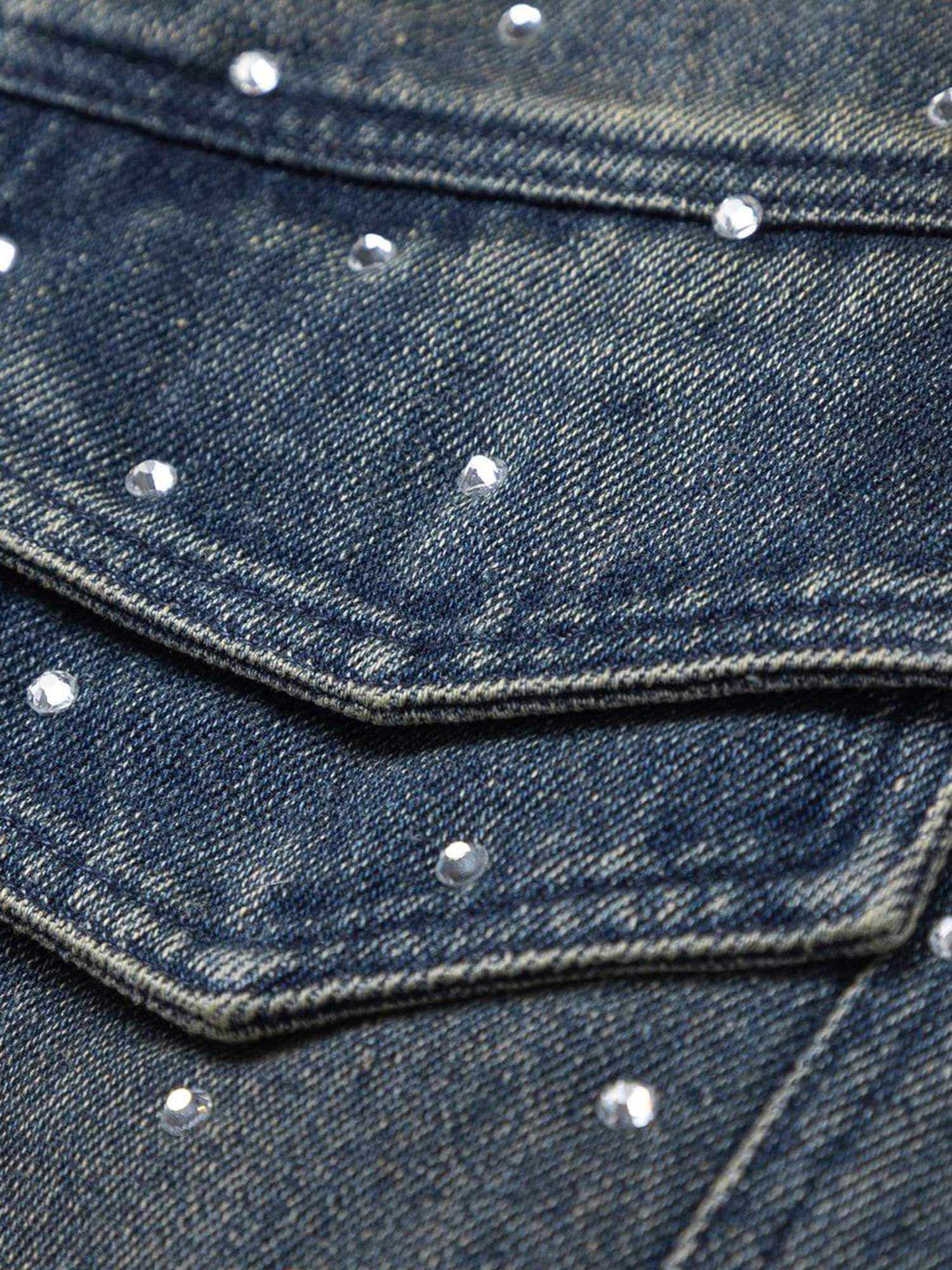 Bring vintage attitude to your wardrobe with the Hip-hop Beaded Washed Denim Jacket — a standout fusion of rugged style and everyday comfort. Crafted from durable denim, this jacket features a unique distressed wash, button closure, chest pockets, and a c