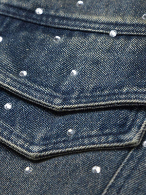 Bring vintage attitude to your wardrobe with the Hip-hop Beaded Washed Denim Jacket — a standout fusion of rugged style and everyday comfort. Crafted from durable denim, this jacket features a unique distressed wash, button closure, chest pockets, and a c