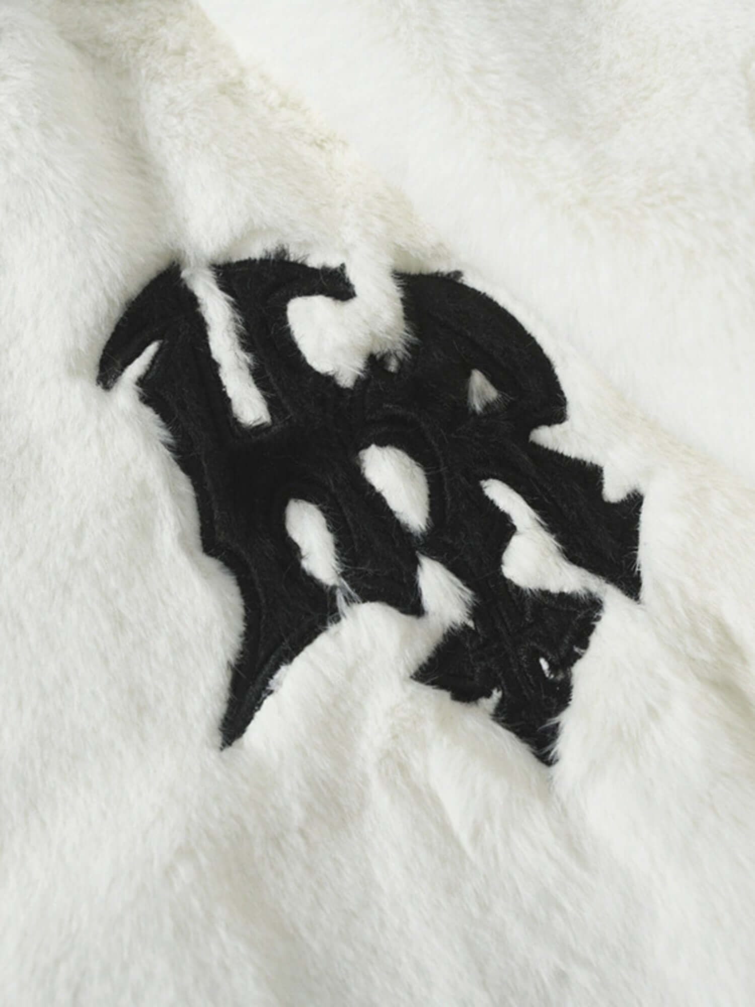 Stay sharp and stylish with the Hip-hop Letter Stand Collar Fur Jacket — a lightweight essential that blends urban attitude with casual comfort. Designed with a clean stand collar, front zipper closure, and an embroidered logo detail, this jacket is perfe