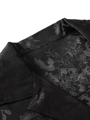 Step into sleek sophistication with the Leaves Pattern Black Vintage Shirt — a versatile piece that blends vintage charm with modern elegance. Made from smooth satin fabric, this short-sleeved shirt features a notched lapel collar, button-up front, and a