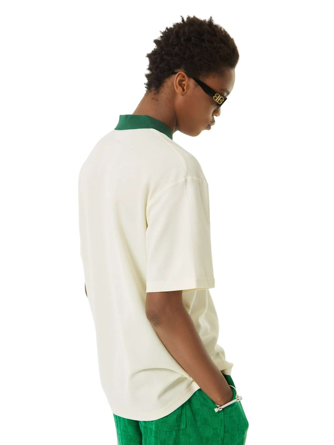 Refresh your casual wardrobe with the Letter Embroidered Polo Shirt. Crafted from a soft and breathable cotton blend, this polo shirt features a stylish embroidered script logo, a contrast collar, and striped sleeve details that add a modern twist to a cl