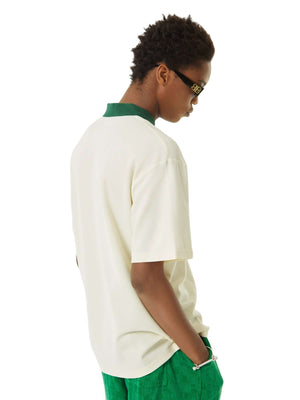 Refresh your casual wardrobe with the Letter Embroidered Polo Shirt. Crafted from a soft and breathable cotton blend, this polo shirt features a stylish embroidered script logo, a contrast collar, and striped sleeve details that add a modern twist to a cl