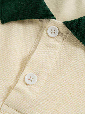 Refresh your casual wardrobe with the Letter Embroidered Polo Shirt. Crafted from a soft and breathable cotton blend, this polo shirt features a stylish embroidered script logo, a contrast collar, and striped sleeve details that add a modern twist to a cl