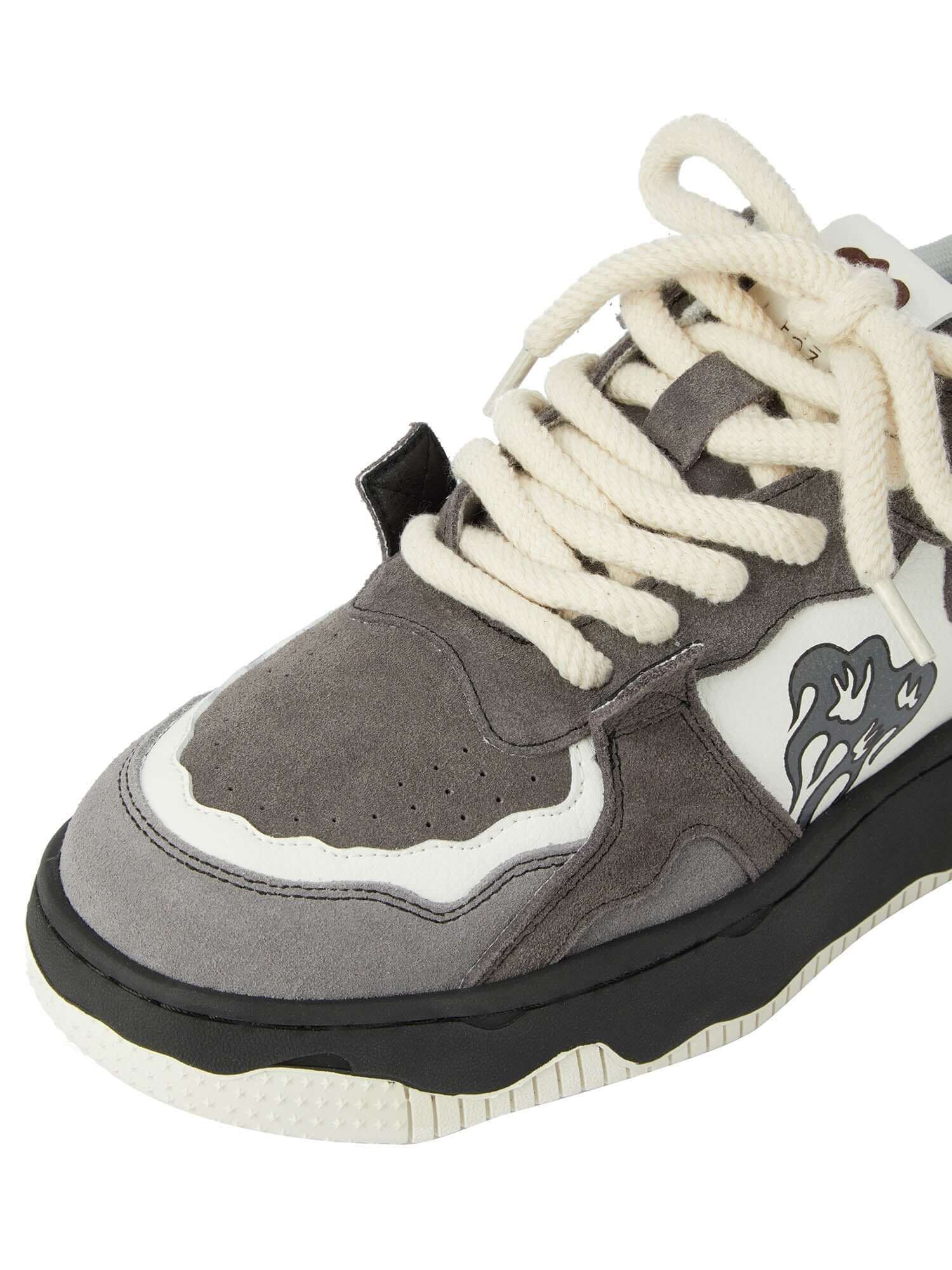 Step into bold streetwear with the Monochrome Shadowwave Heavy Duty Street Sneakers. Built for comfort and edge, these sneakers feature a rugged canvas upper, chunky rubber sole, and a stylish camouflage print that commands attention. Reflective laces add