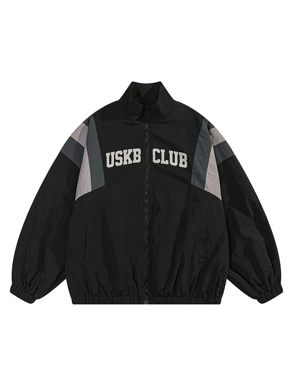 Step out in bold confidence with the Patchwork Contrasting Windbreaker Jacket — a lightweight statement piece inspired by retro athletic wear. Made from durable polyester, this jacket features a dynamic color-block pattern with contrast panels, a branded