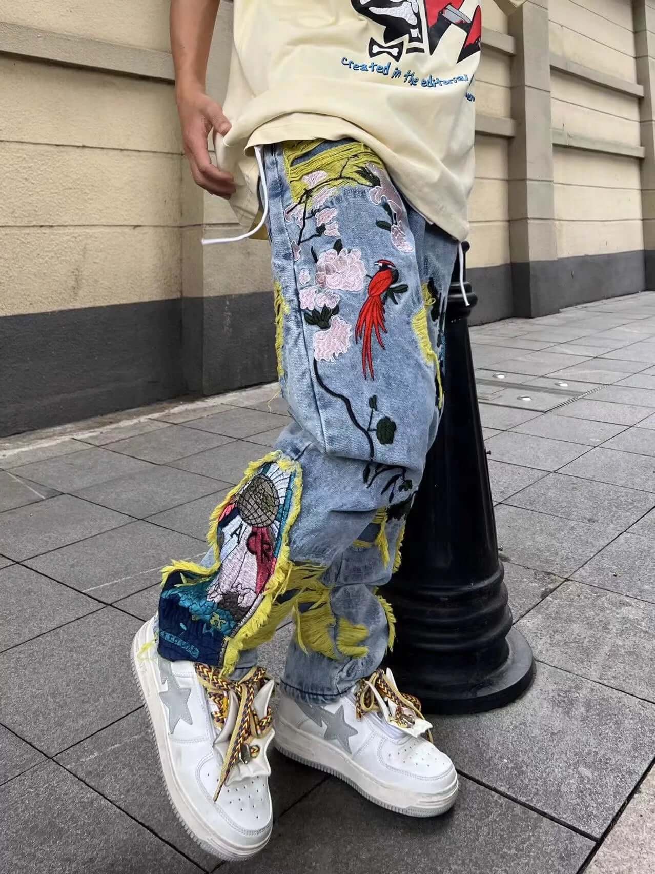 Elevate your everyday style with the Plum Embroidery Jeans — a bold blend of comfort and creativity. These high-waisted, wide-leg jeans feature vibrant abstract floral and geometric embroidery that adds personality to any outfit. Crafted from durable deni