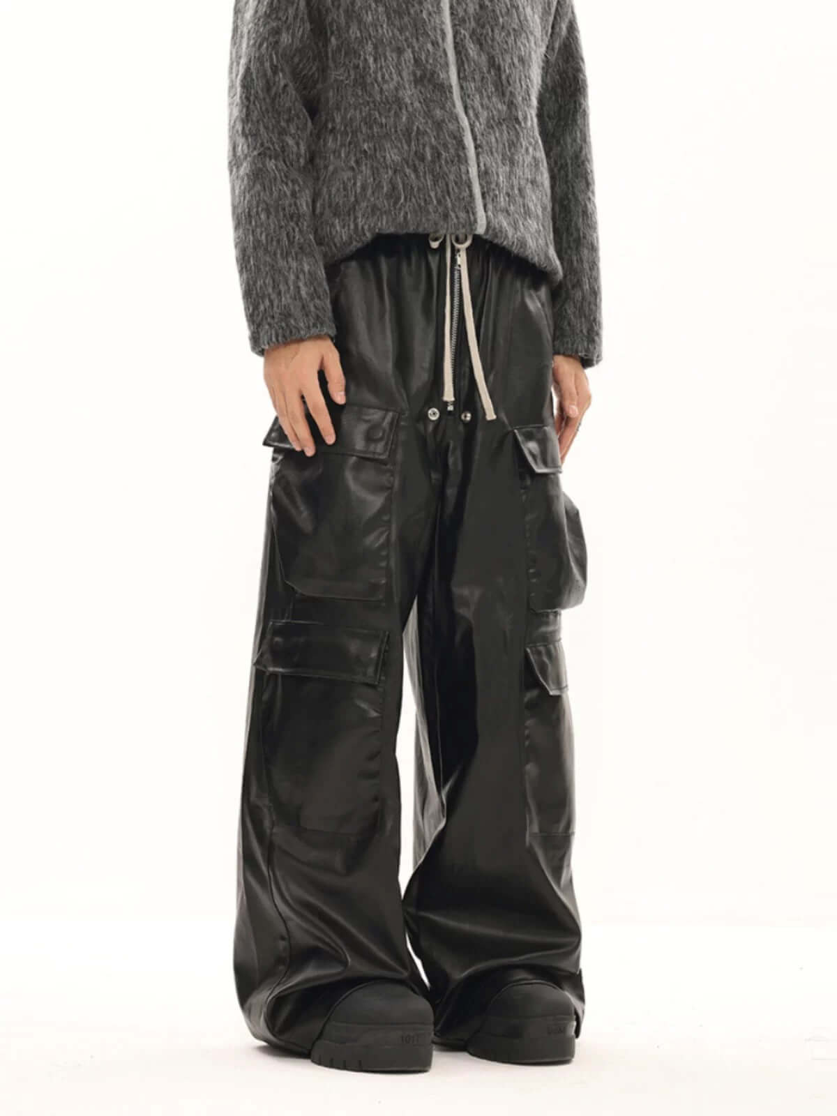 Step up your streetwear with the RO Style Multi Pocket Matte Coated Overalls. Made from a durable cotton blend, these overalls feature a matte finish with a modern edge and a utility-inspired design. The multiple functional pockets offer both style and pr