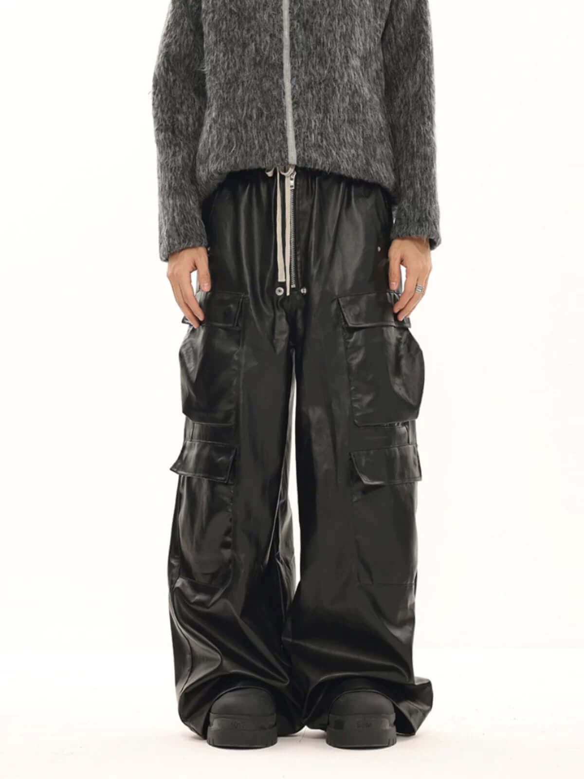 Step up your streetwear with the RO Style Multi Pocket Matte Coated Overalls. Made from a durable cotton blend, these overalls feature a matte finish with a modern edge and a utility-inspired design. The multiple functional pockets offer both style and pr