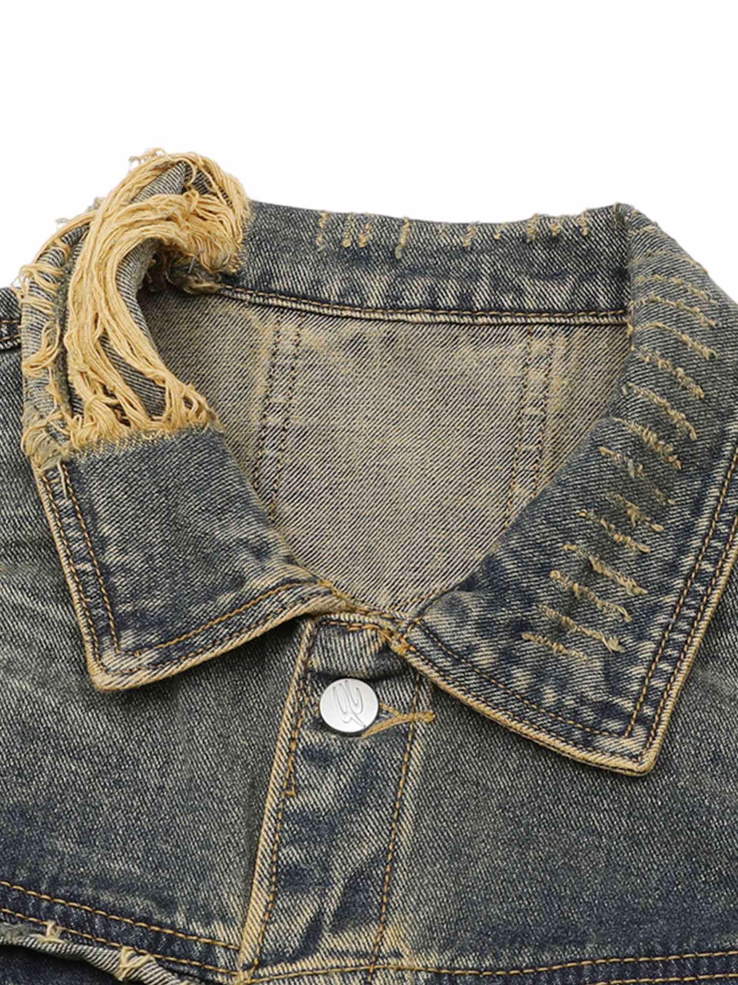 Turn heads with the Raw Edge Distressed Denim Jacket — a bold streetwear essential combining rugged denim with statement gold chain detailing. This long-sleeve jacket features raw hems, distressed accents, and front chest pockets with button closure for a