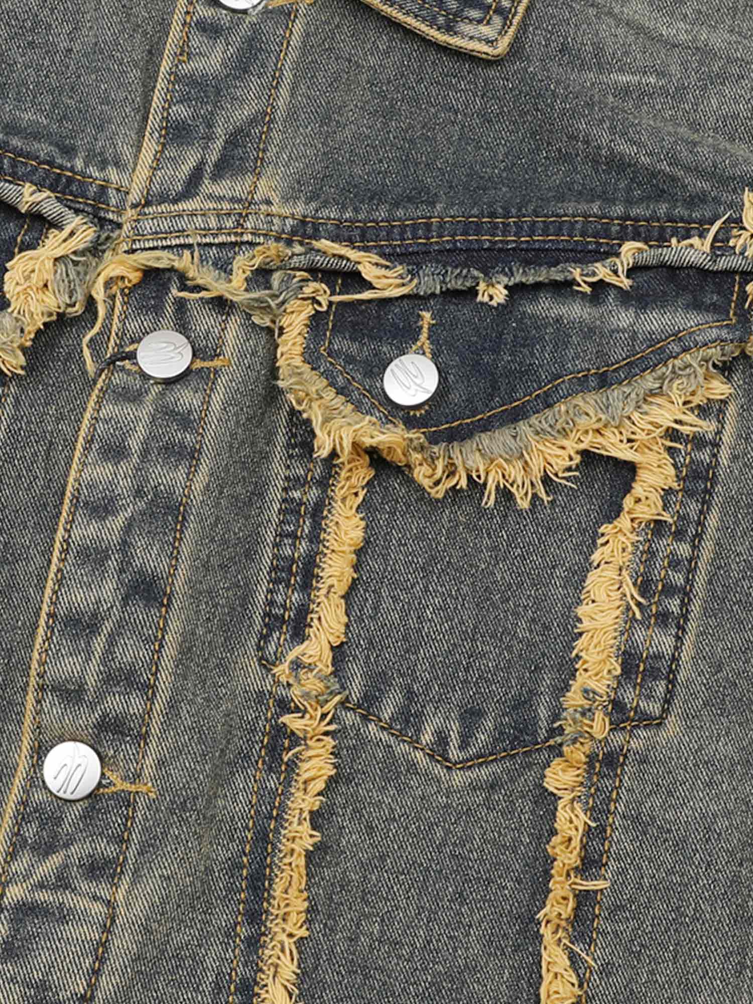 Turn heads with the Raw Edge Distressed Denim Jacket — a bold streetwear essential combining rugged denim with statement gold chain detailing. This long-sleeve jacket features raw hems, distressed accents, and front chest pockets with button closure for a
