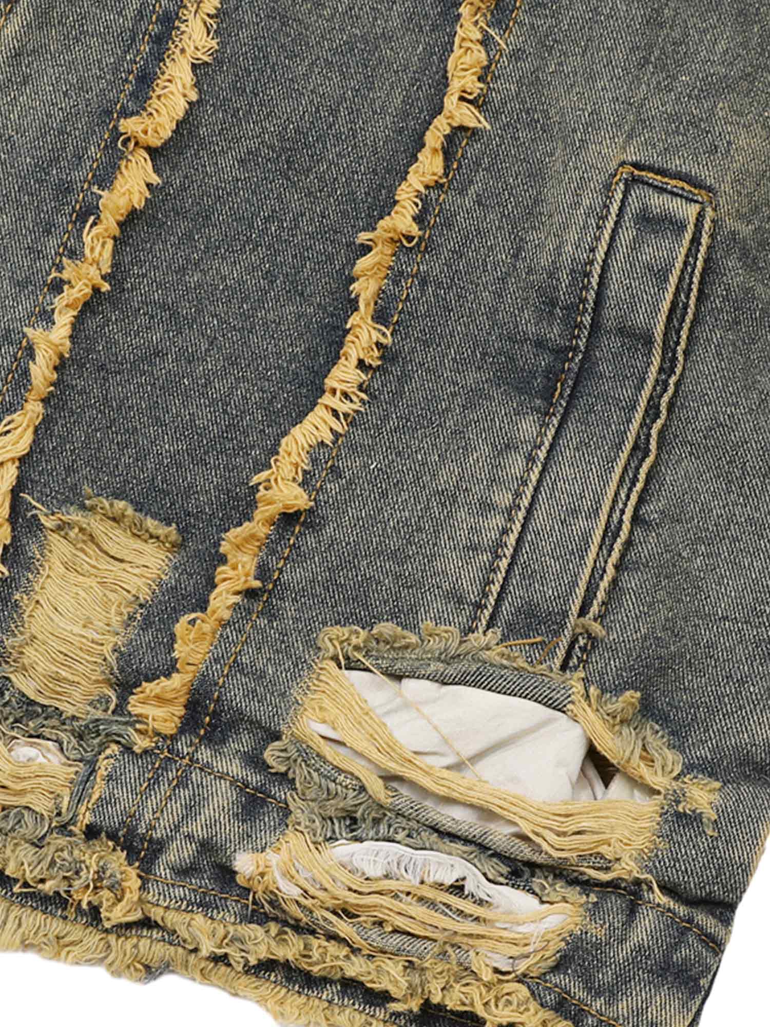 Turn heads with the Raw Edge Distressed Denim Jacket — a bold streetwear essential combining rugged denim with statement gold chain detailing. This long-sleeve jacket features raw hems, distressed accents, and front chest pockets with button closure for a