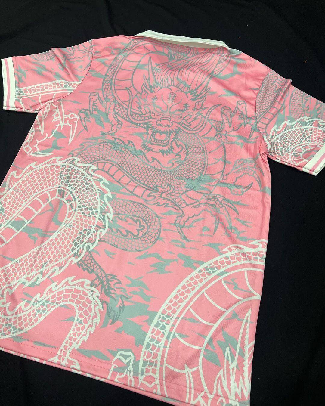 Show off your love for Real Madrid and Hello Kitty with our Dragon Jersey! Made with high-quality materials for maximum comfort and durability. Perfect for any fan or collector, this jersey showcases unique design elements that make it truly one-of-a-kind