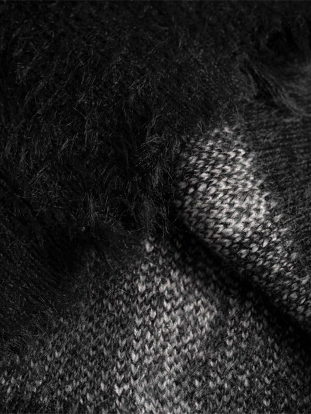 Elevate your cool-weather wardrobe with the Ripped Knit Turtleneck Sweater — a bold and modern piece with an artistic edge. Made from soft knit fabric, this sweater features a high neckline, long sleeves, and a distinctive lace-up front that adds texture