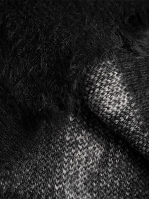 Elevate your cool-weather wardrobe with the Ripped Knit Turtleneck Sweater — a bold and modern piece with an artistic edge. Made from soft knit fabric, this sweater features a high neckline, long sleeves, and a distinctive lace-up front that adds texture
