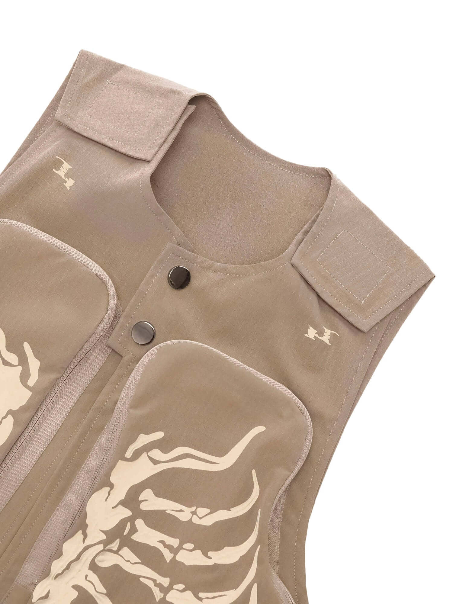 Turn heads with the Skeleton Print Padded Cargo Vest — the perfect blend of edgy design and functional streetwear. Made from lightweight fabric with a bold reflective skeleton print, this vest is designed for comfort, movement, and high-impact visual styl