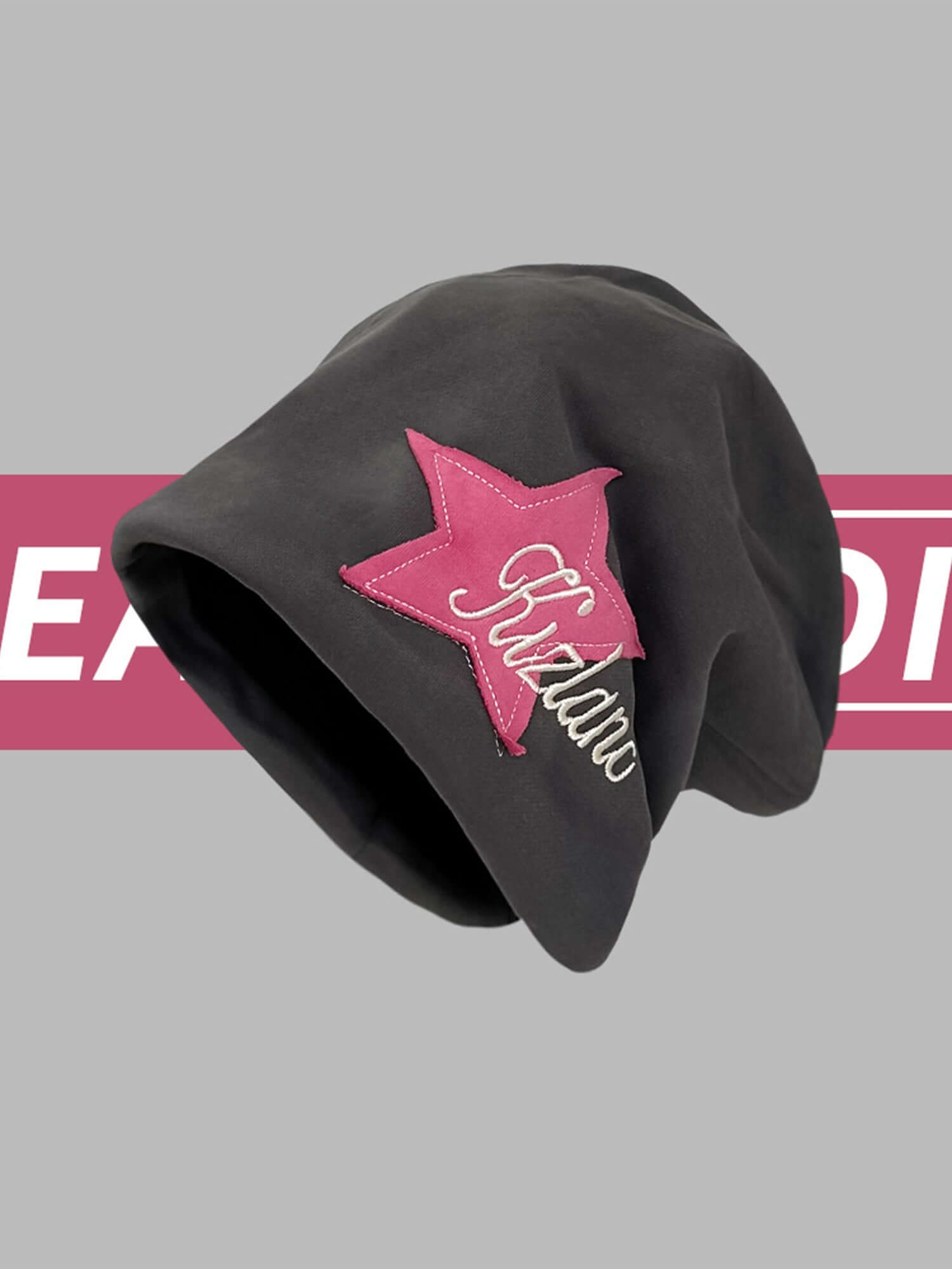 Add a playful edge to your outfit with the Star Embroidered Wrap Hat — the perfect blend of comfort and bold street style. Made from soft acrylic, this hat features a stylish pink star print, "Rockstar" text embroidery, and a stretchy fit that provides a